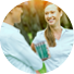 Portrait of smiling couple talking while standing in park